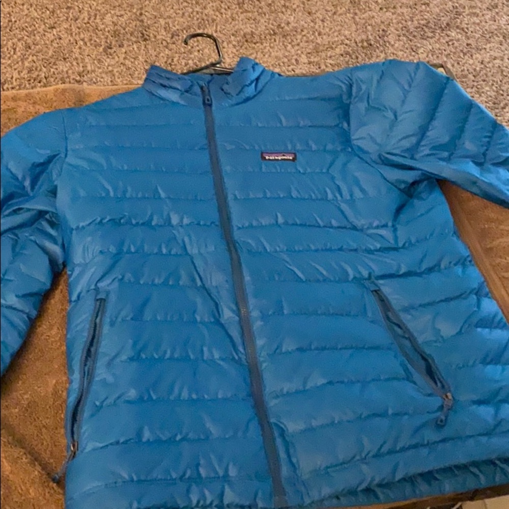 Patagonia down jacket folds into pillow
